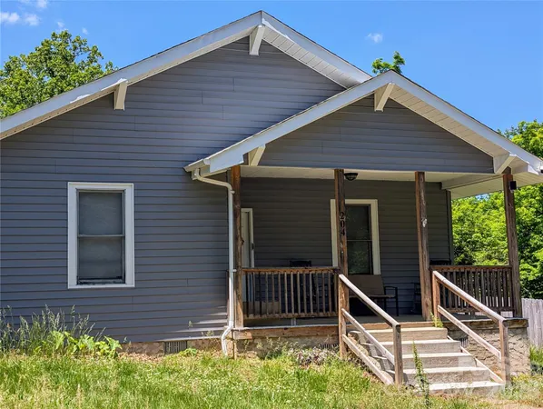 a front view of a house with porch