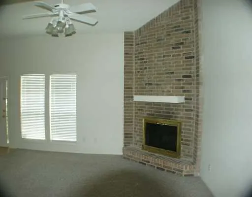 a view of a livingroom with a fireplace