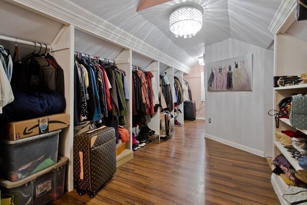 177 Belvidere Street Springfield, MA 01108 - Photo 18 of 24 a view of walk in closet with clothes and shoes