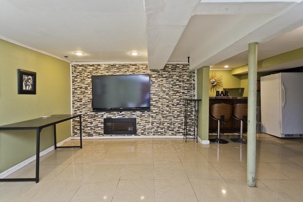 177 Belvidere Street Springfield, MA 01108 - Photo 21 of 24 a living room with a flat screen tv and outdoor view