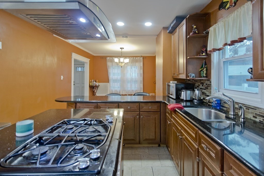 177 Belvidere Street Springfield, MA 01108 - Photo 9 of 24 a kitchen with a stove and a sink