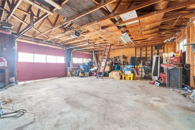 a view of a house with a tree