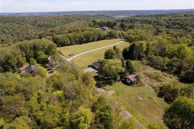 a view of a town with mountains in the background