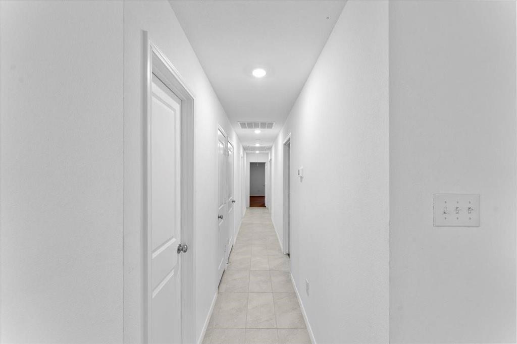 211 Herman Lane Princeton, TX 75407 - Photo 12 of 40 a view of a hallway