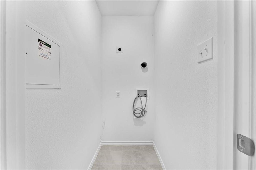 211 Herman Lane Princeton, TX 75407 - Photo 14 of 40 a view of a room with racks on the wall