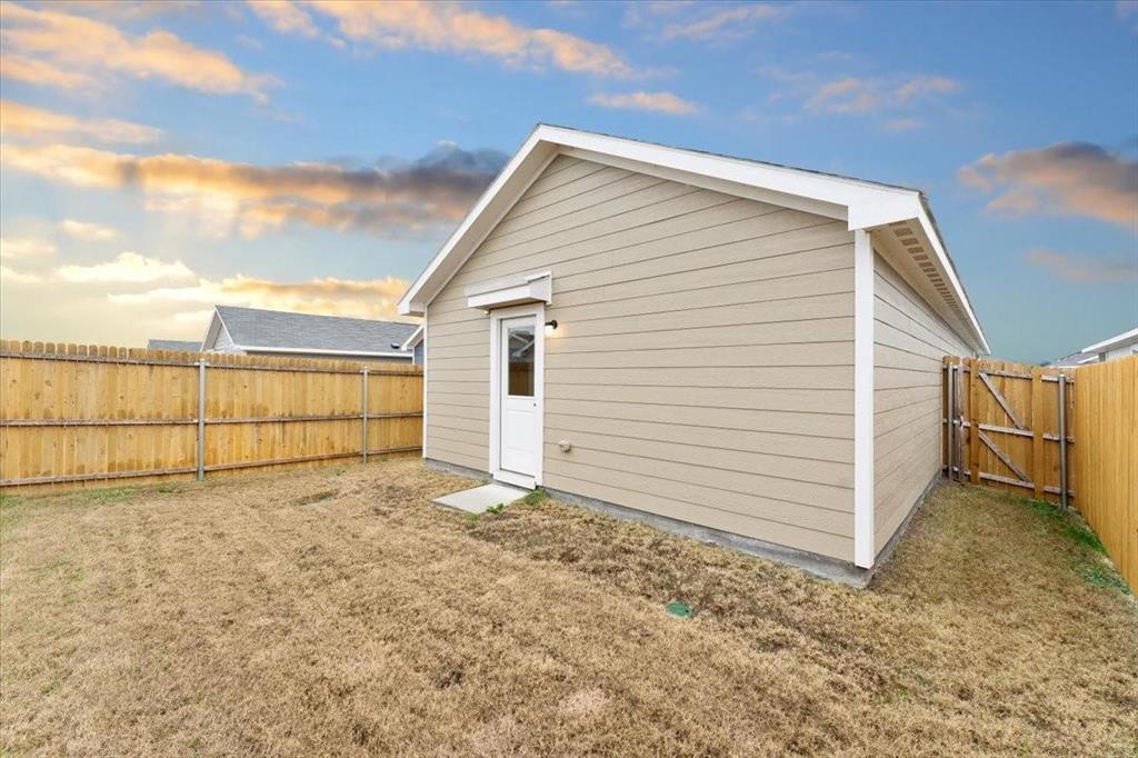 211 Herman Lane Princeton, TX 75407 - Photo 38 of 40 a view of a backyard