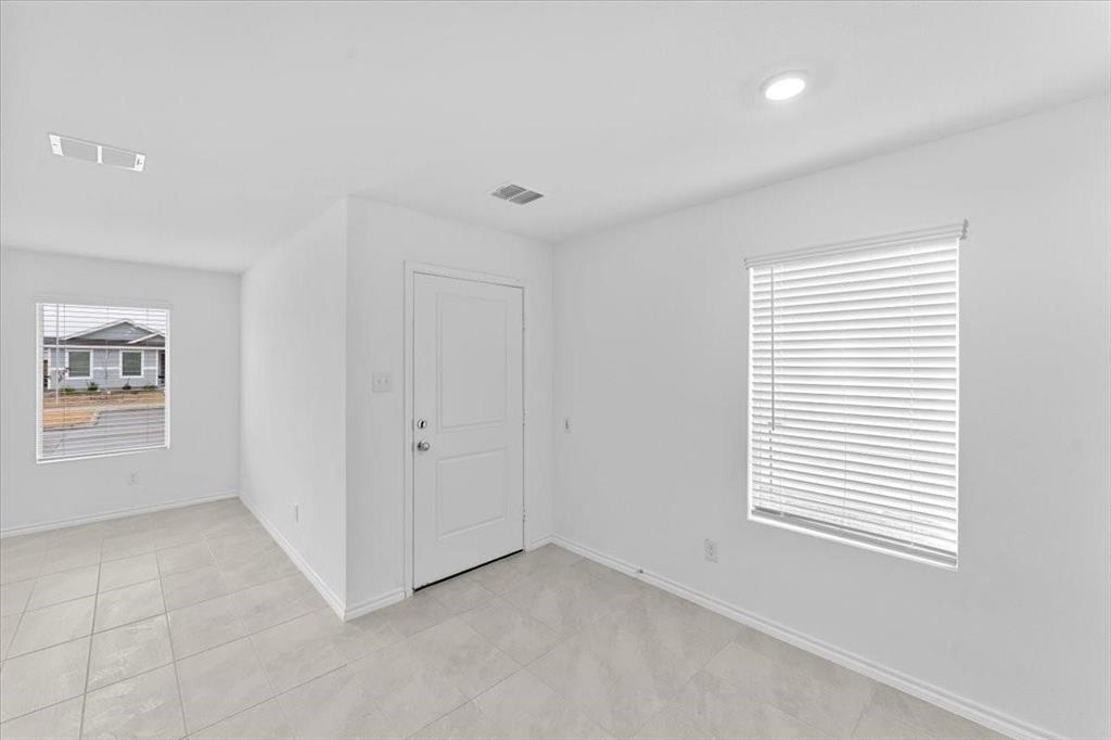 211 Herman Lane Princeton, TX 75407 - Photo 5 of 40 a view of an empty room with a window
