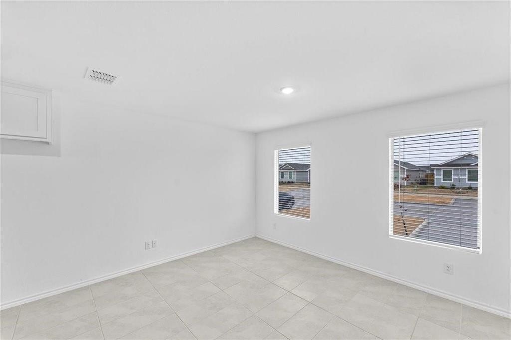 211 Herman Lane Princeton, TX 75407 - Photo 6 of 40 an empty room with windows