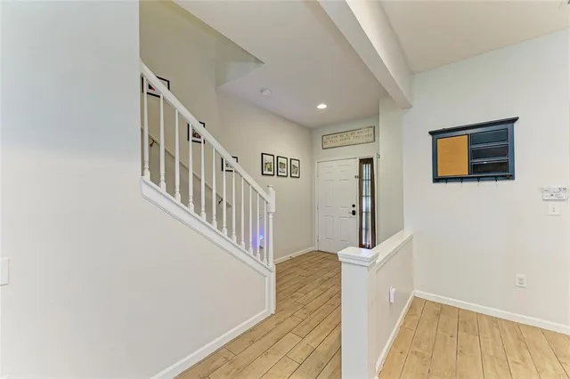 a kitchen with stainless steel appliances a refrigerator and a stove