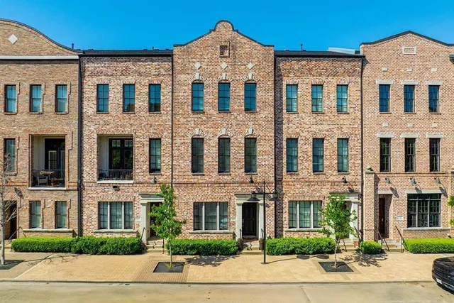 a front view of a multi story residential apartment building
