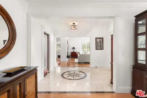a view of a livingroom with furniture and window