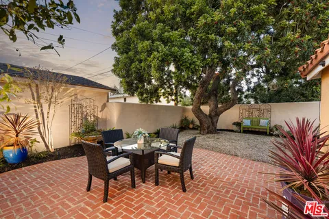 an outdoor space with furniture