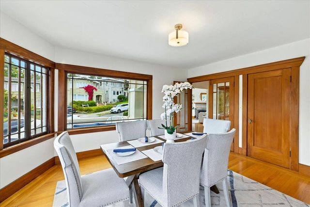 a kitchen with a stove a sink and a refrigerator