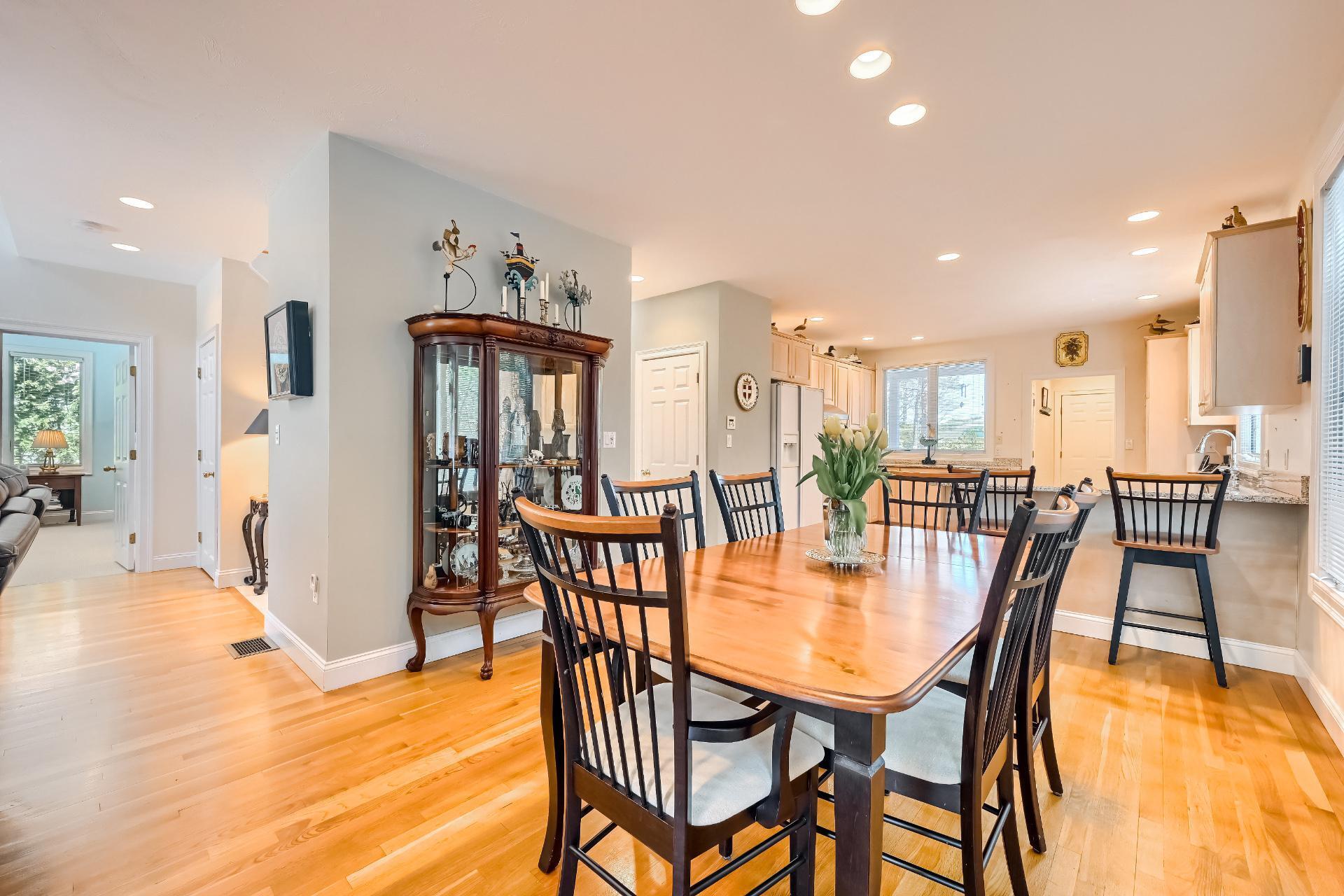 4 Tide Run Mashpee, MA 02649 - Photo 12 of 46 a dining room with furniture and wooden floor