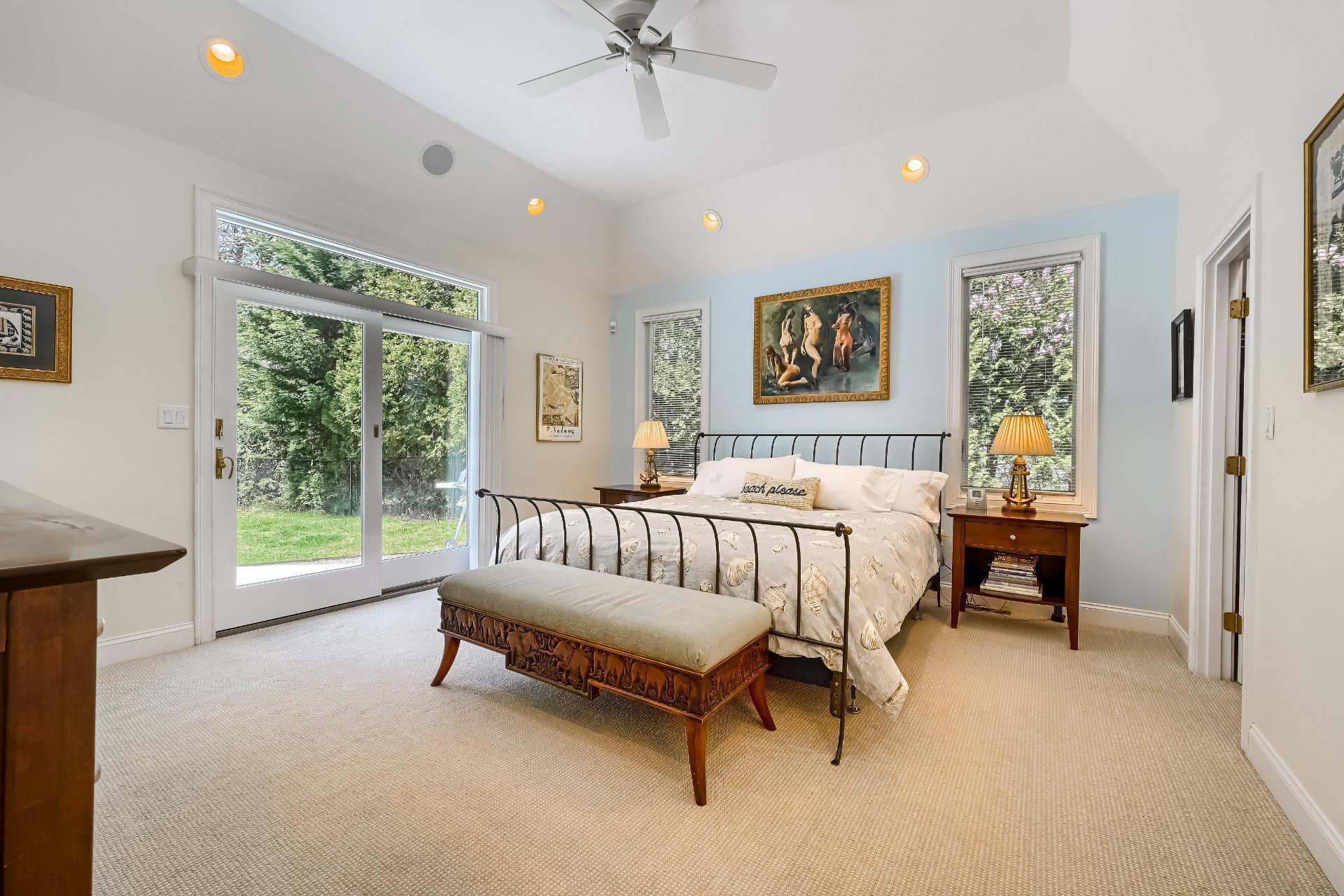 4 Tide Run Mashpee, MA 02649 - Photo 14 of 46 a bed room with a bed and a chandelier