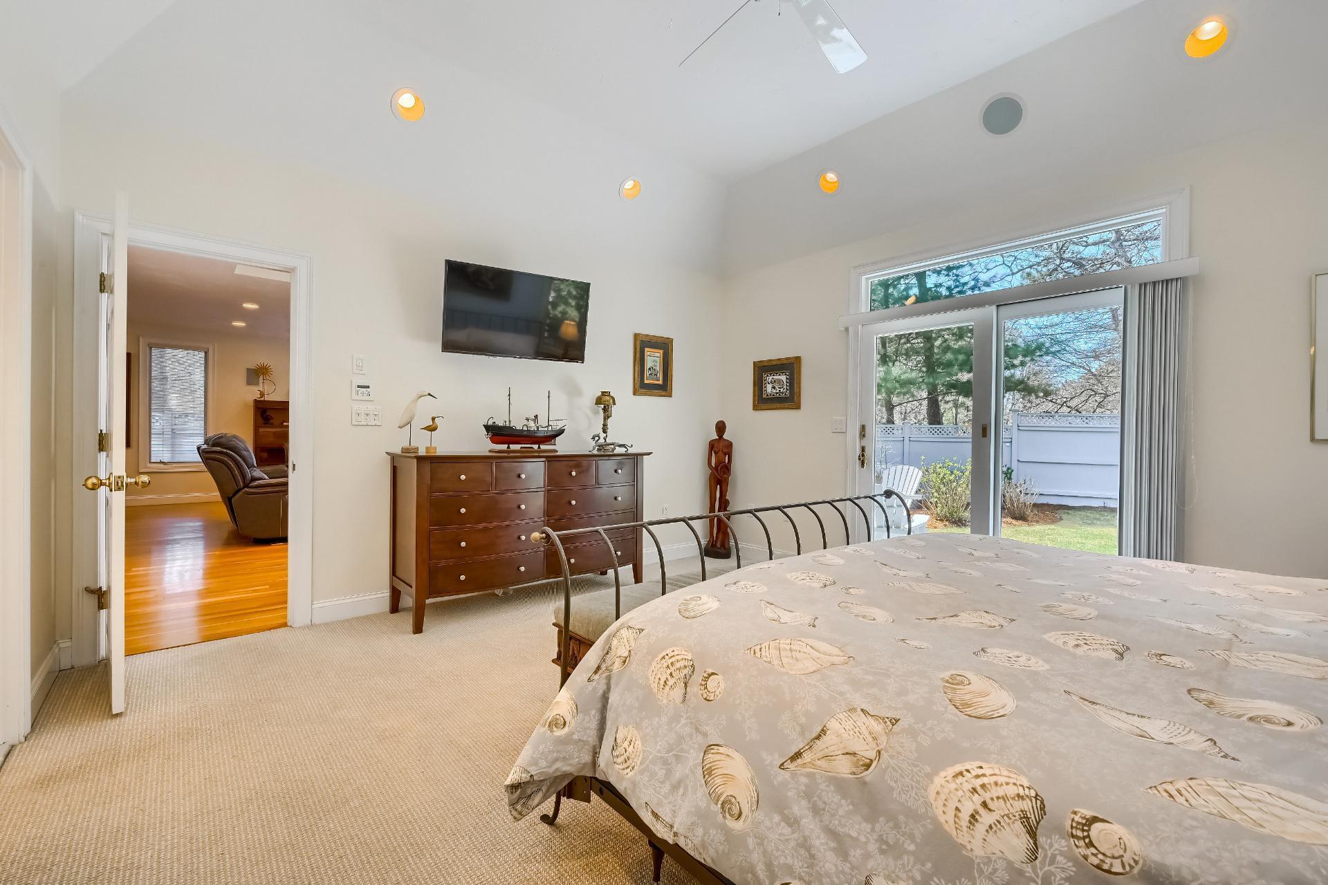 4 Tide Run Mashpee, MA 02649 - Photo 15 of 46 a bed room with a bed and a television