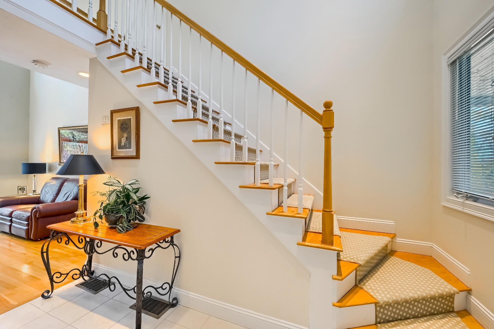 4 Tide Run Mashpee, MA 02649 - Photo 19 of 46 a view of entryway and hall with wooden floor