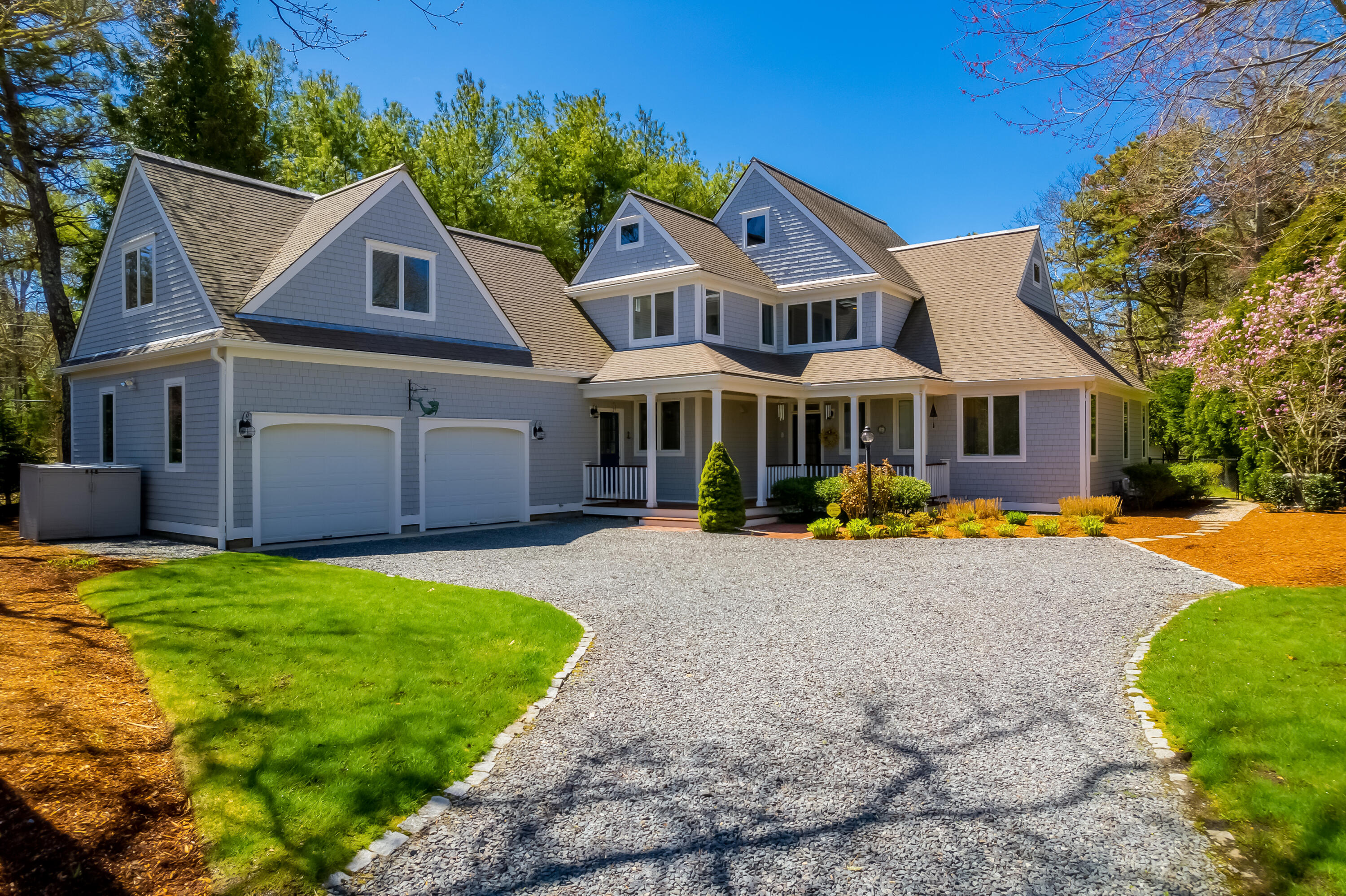 4 Tide Run Mashpee, MA 02649 - Photo 2 of 46 a view of a house with a yard and sitting area