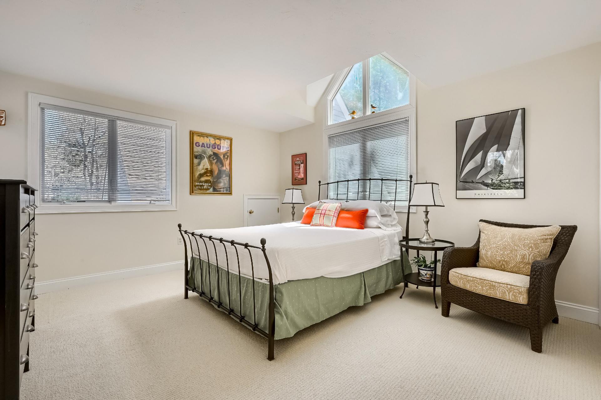 4 Tide Run Mashpee, MA 02649 - Photo 22 of 46 a bedroom with a bed couch and a window