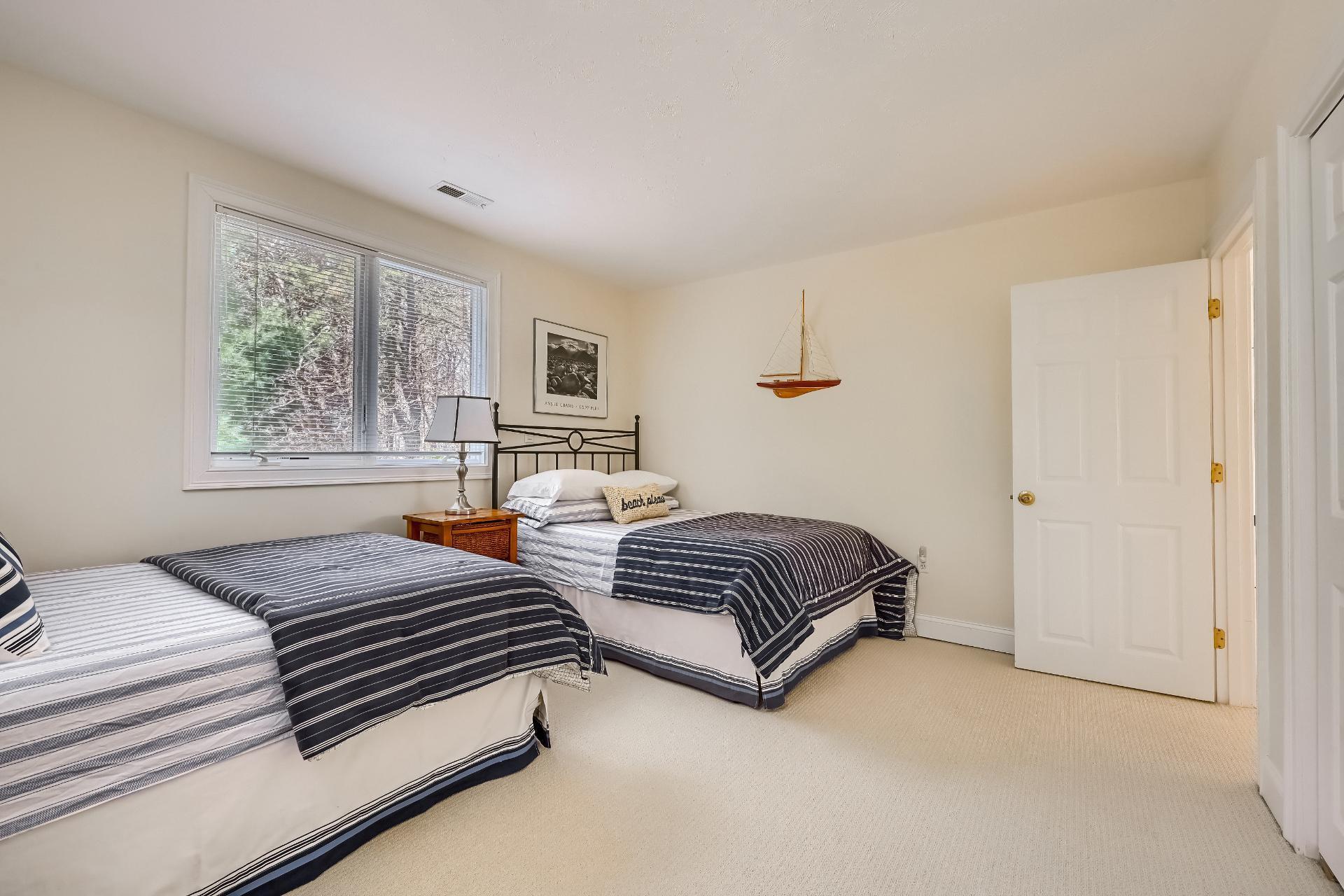 4 Tide Run Mashpee, MA 02649 - Photo 25 of 46 a bedroom with two beds and a large window