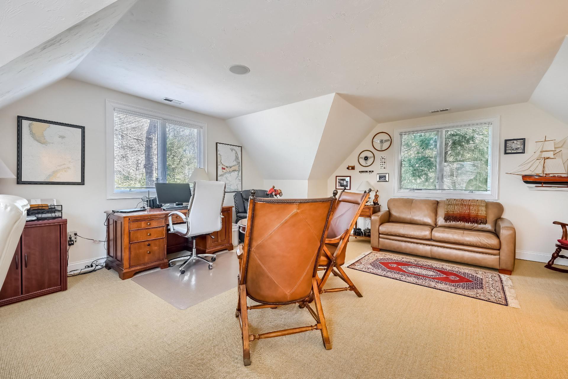 4 Tide Run Mashpee, MA 02649 - Photo 32 of 46 a living room with furniture and a window