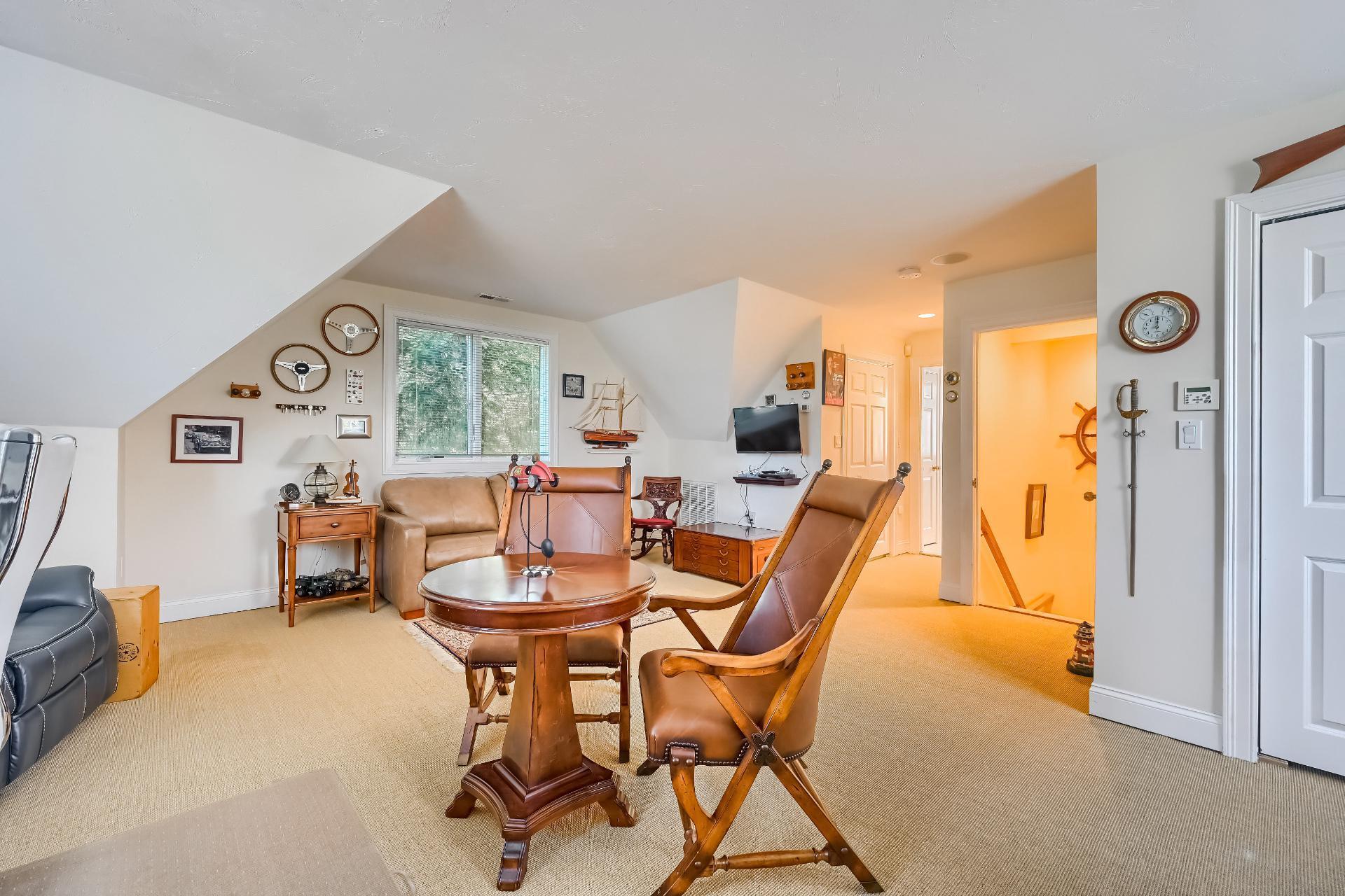 4 Tide Run Mashpee, MA 02649 - Photo 33 of 46 a dining room with furniture and a large window