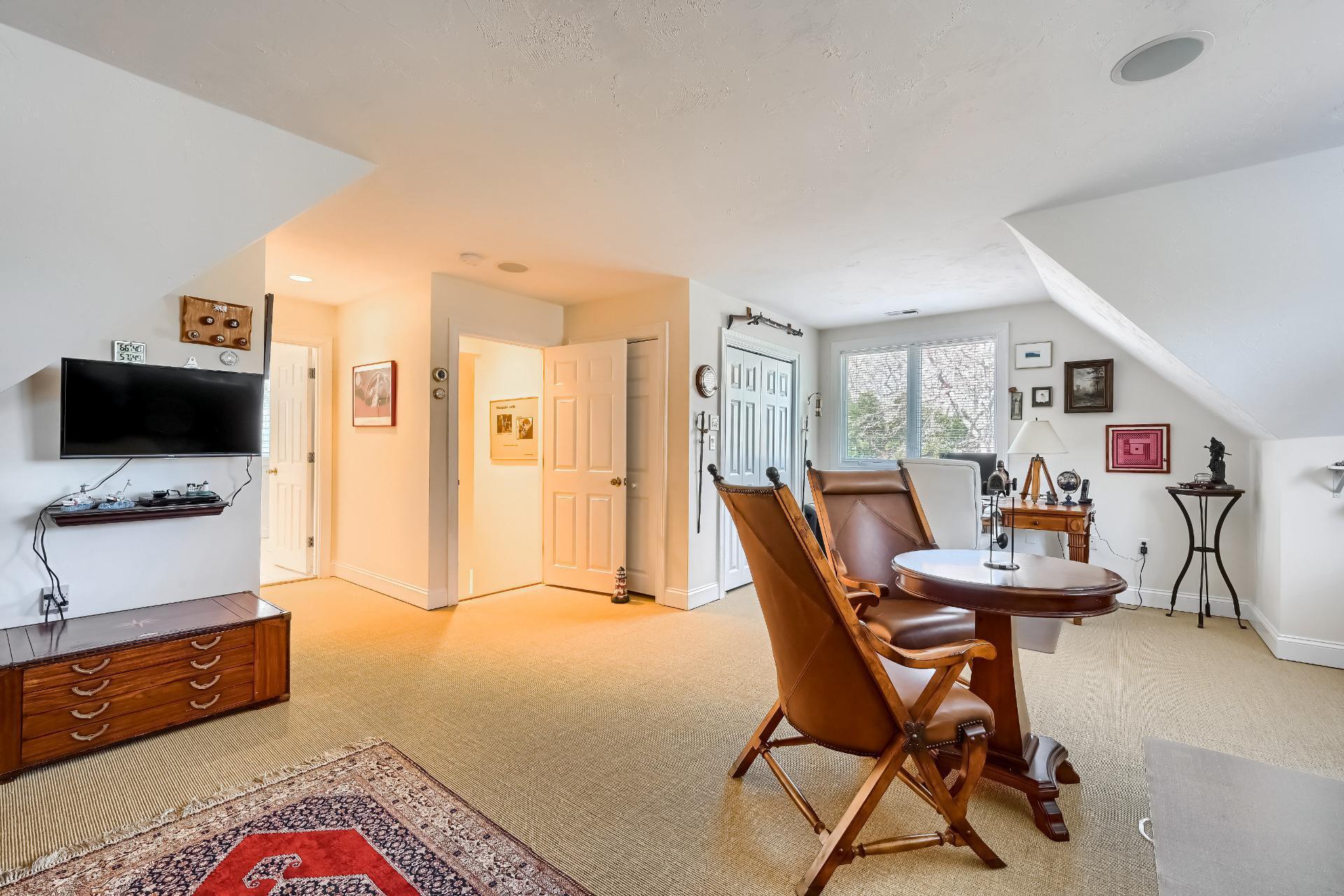 4 Tide Run Mashpee, MA 02649 - Photo 34 of 46 a workspace with furniture and a flat screen tv