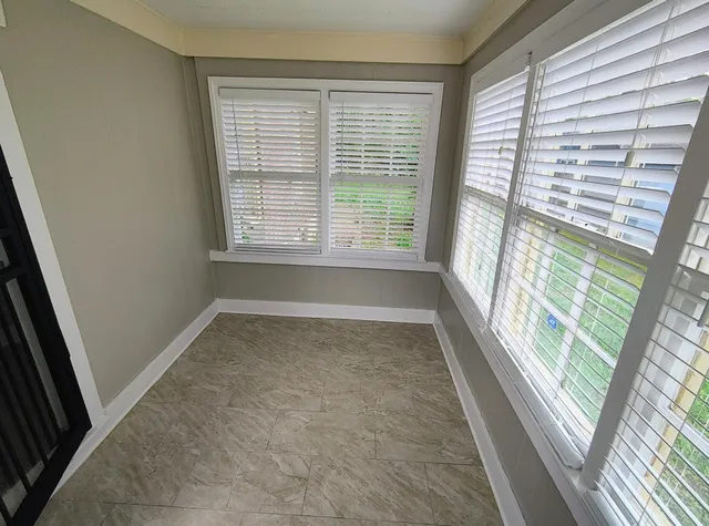 a view of a room with a porch