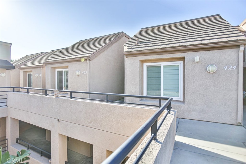 1200 Pacific Coast Highway, Unit 423 Huntington Beach, CA 92648 - Photo 17 of 40 a view of house with large windows