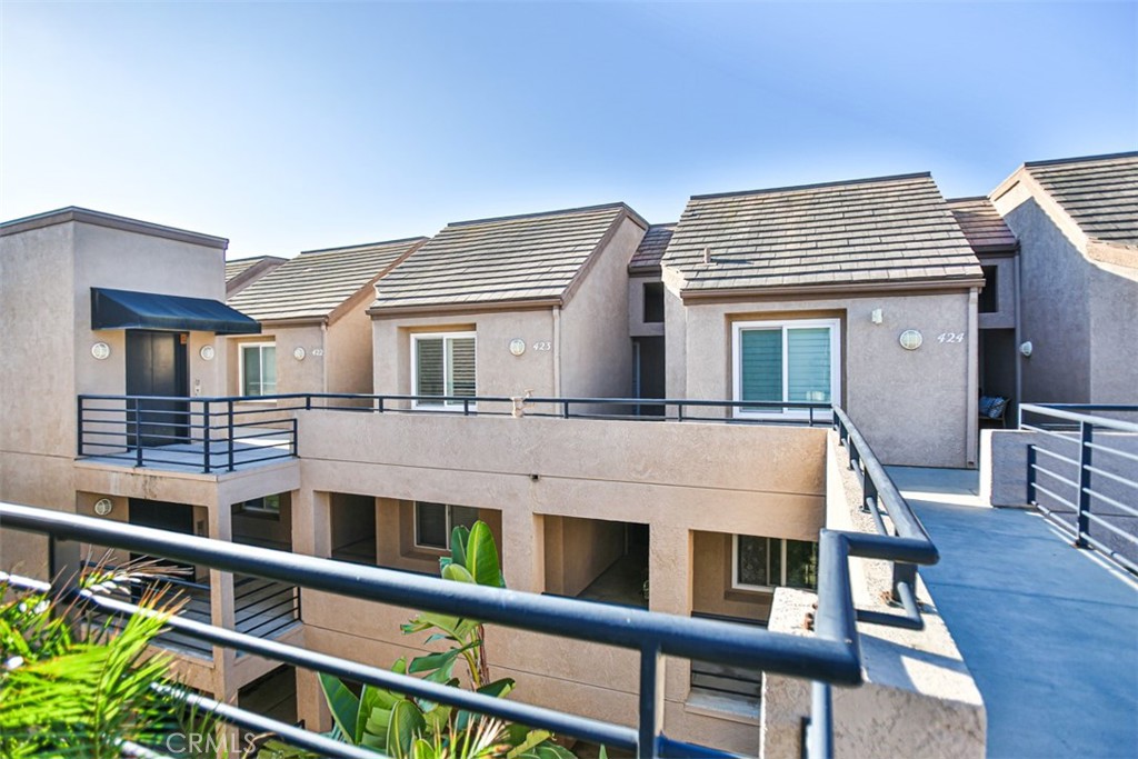1200 Pacific Coast Highway, Unit 423 Huntington Beach, CA 92648 - Photo 20 of 40 a view of a house with roof deck