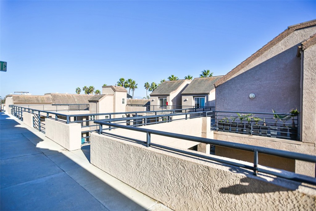 1200 Pacific Coast Highway, Unit 423 Huntington Beach, CA 92648 - Photo 21 of 40 a view of a balcony with chairs