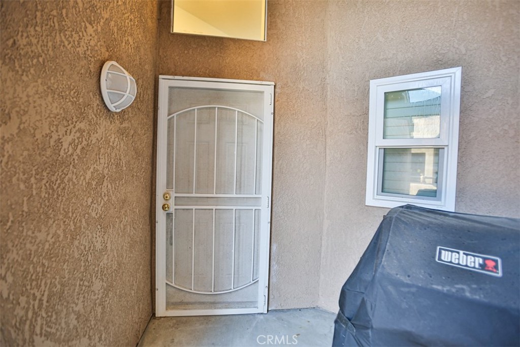 1200 Pacific Coast Highway, Unit 423 Huntington Beach, CA 92648 - Photo 23 of 40 a view of a livingroom with wooden floor
