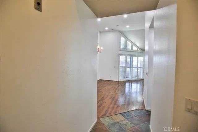 a view of hallway with windows