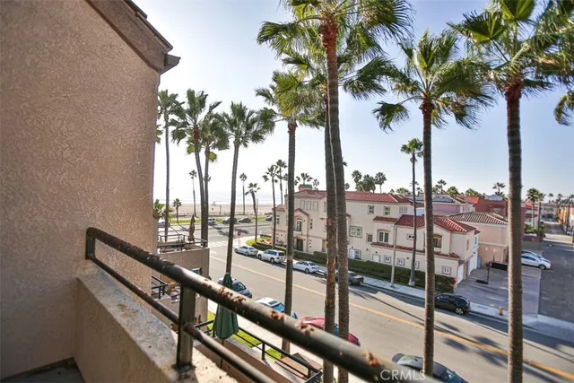 a view of swimming pool from a balcony