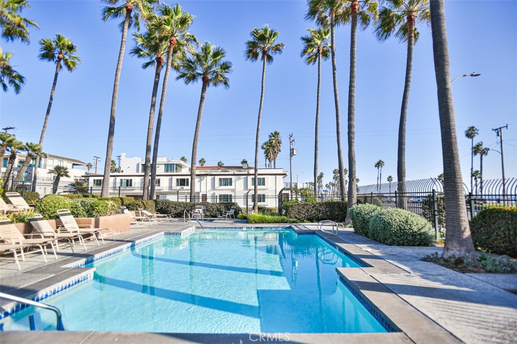 1200 Pacific Coast Highway, Unit 423 Huntington Beach, CA 92648 - Photo 9 of 40 a view of an ocean with palm trees