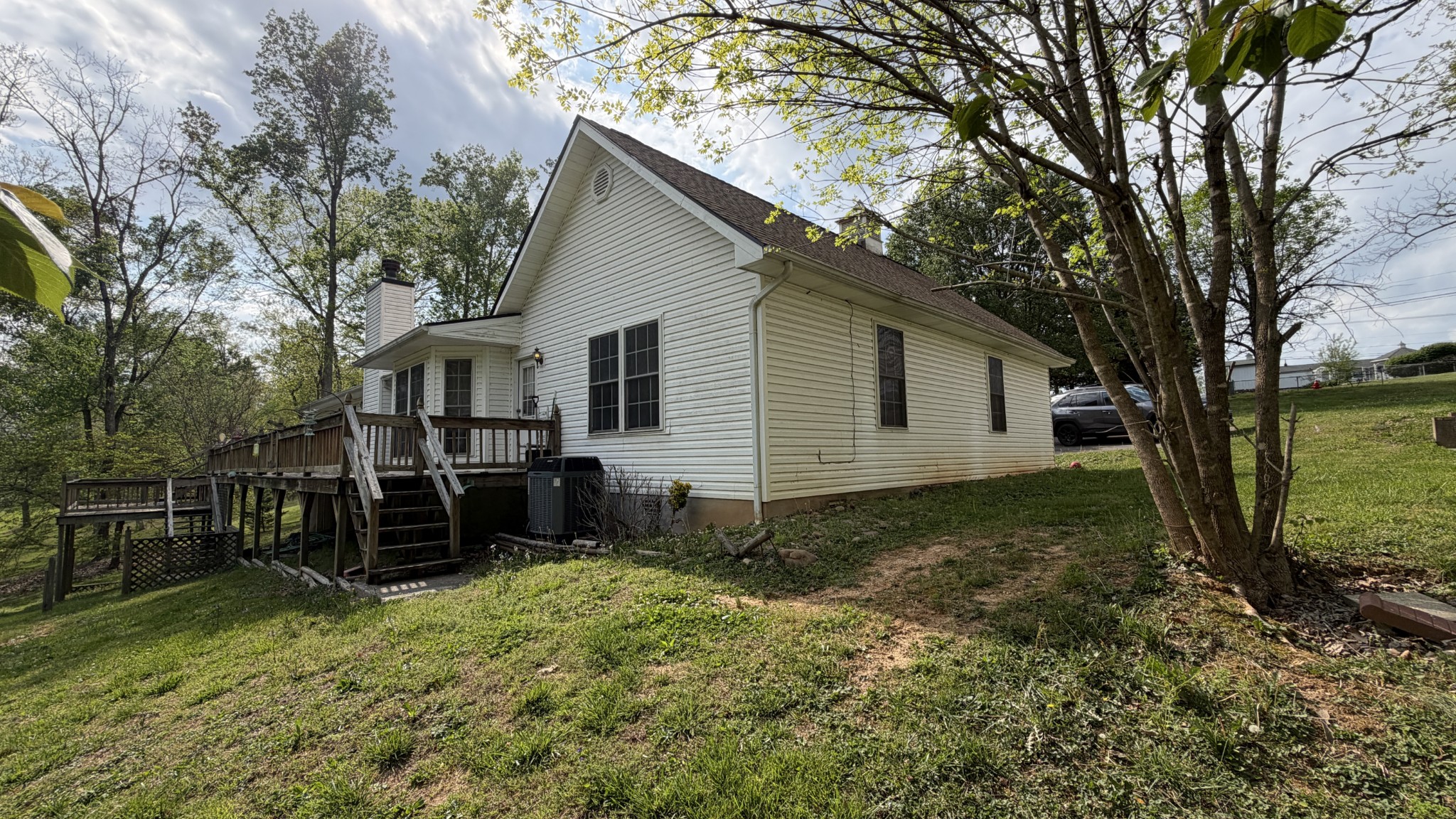 237 Brooks Road Maynardville, TN 37807 - Photo 2 of 20 a view of a house with backyard and trees