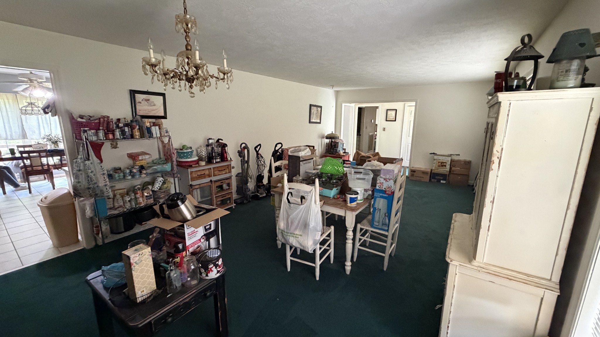237 Brooks Road Maynardville, TN 37807 - Photo 10 of 20 a view of a dining room with furniture and chandelier