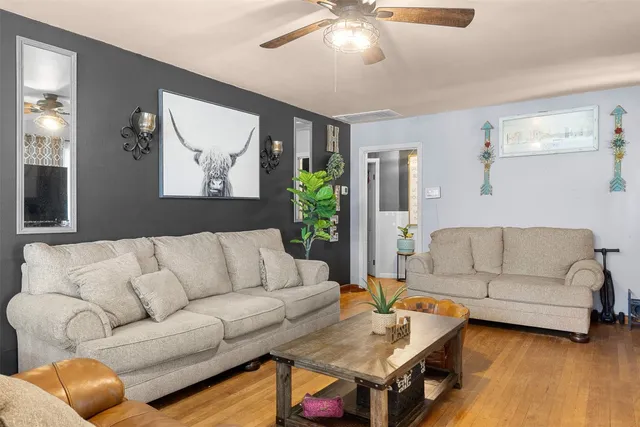 a living room with furniture and a couch