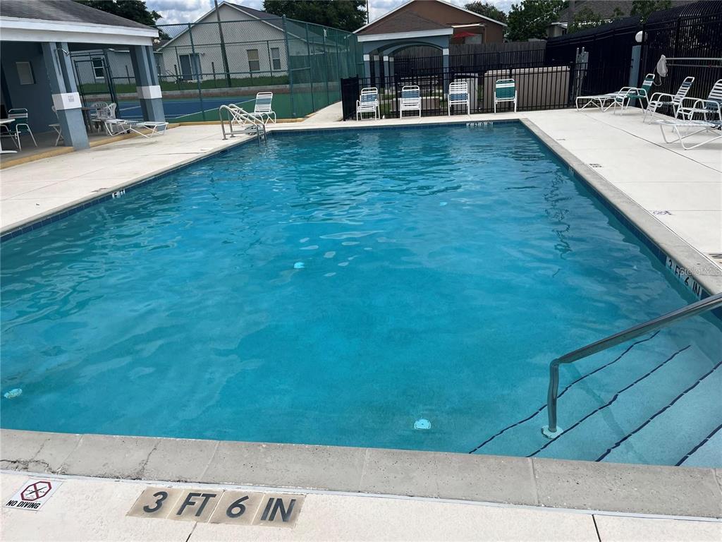 126 Piano Lane Davenport, FL 33896 - Photo 22 of 24 a view of swimming pool with seating space