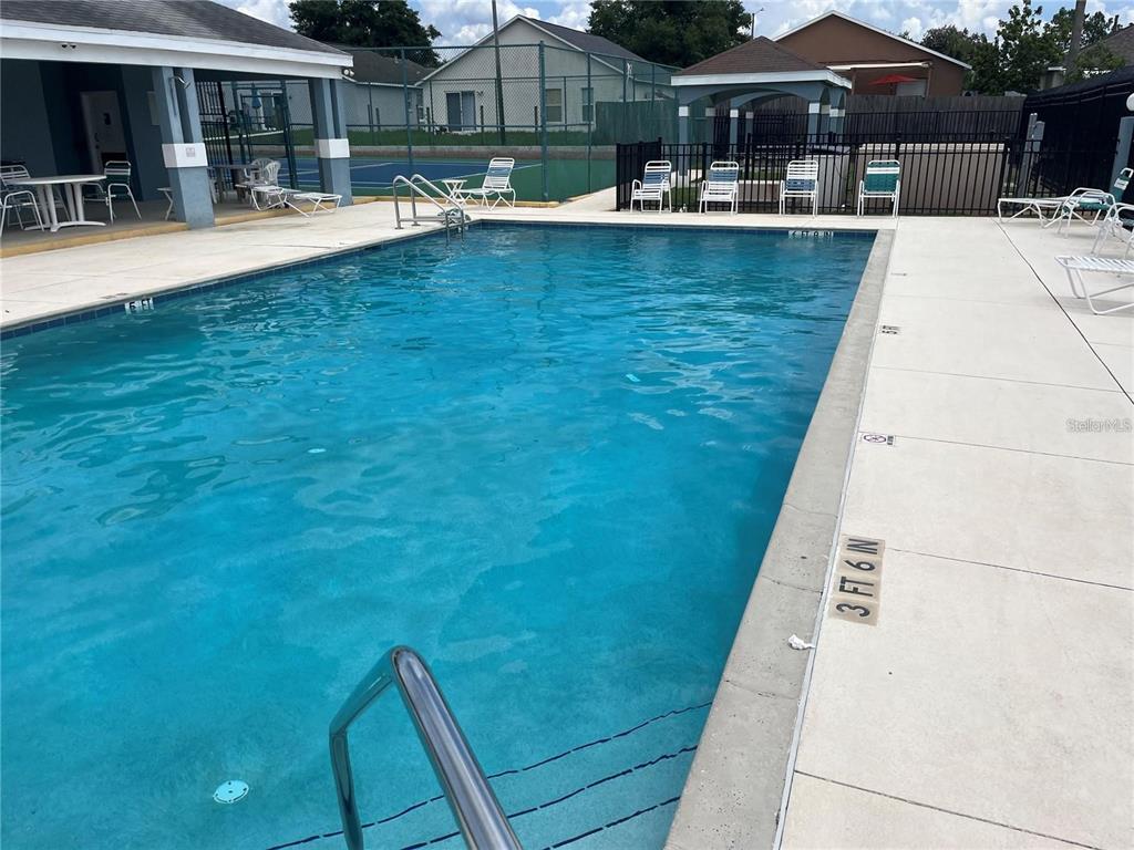 126 Piano Lane Davenport, FL 33896 - Photo 24 of 24 a view of swimming pool with outdoor seating and barbeque oven