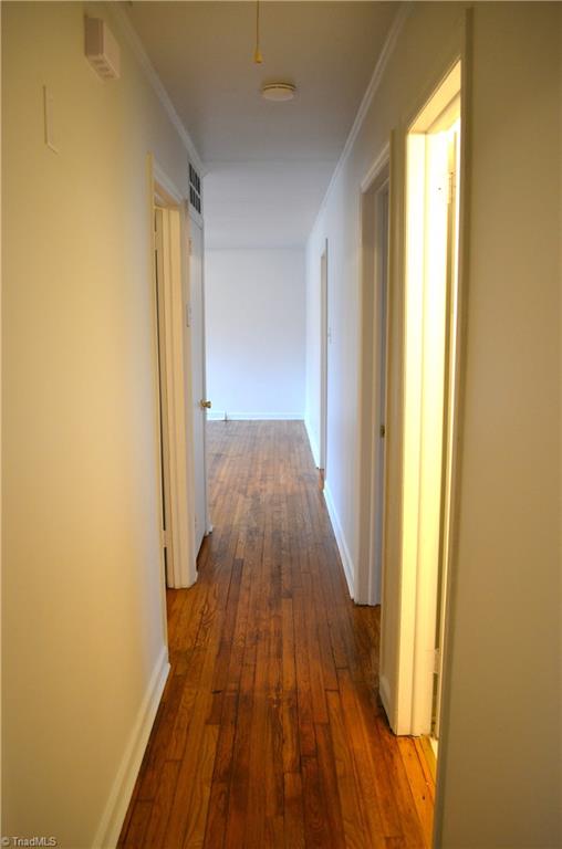 2802 Holmes Road Greensboro, NC 27405 - Photo 18 of 23 Hall back to living room