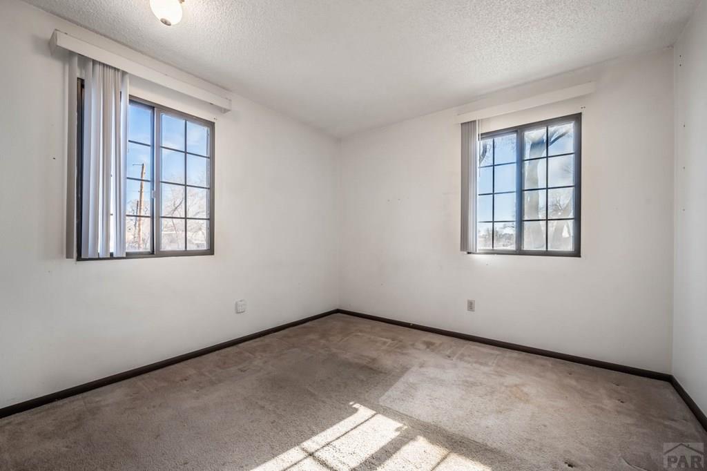 1901 Mohawk Road Pueblo, CO 81001 - Photo 15 of 30 a view of an empty room with a window