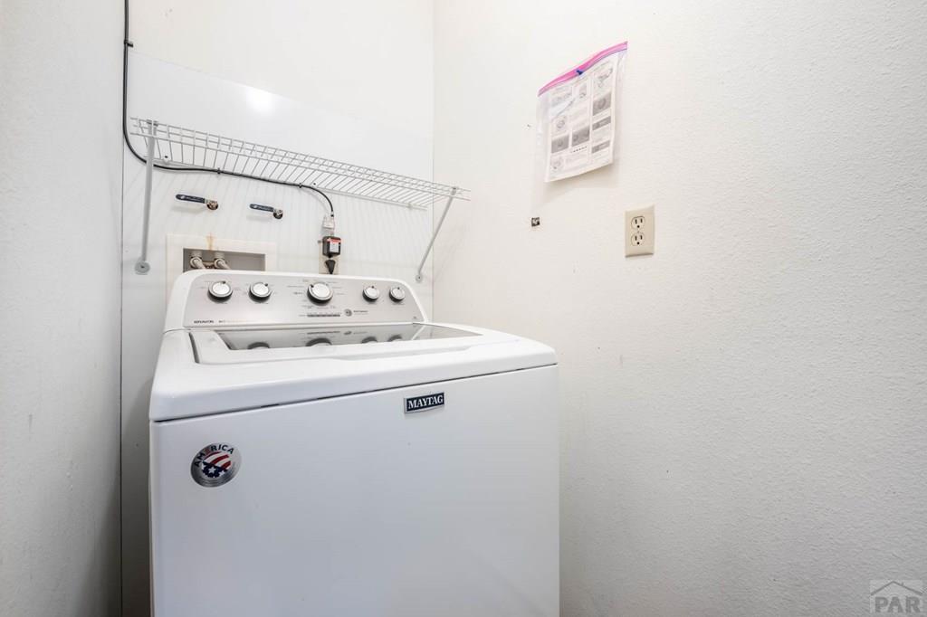 1901 Mohawk Road Pueblo, CO 81001 - Photo 20 of 30 a utility room with dryer and washer