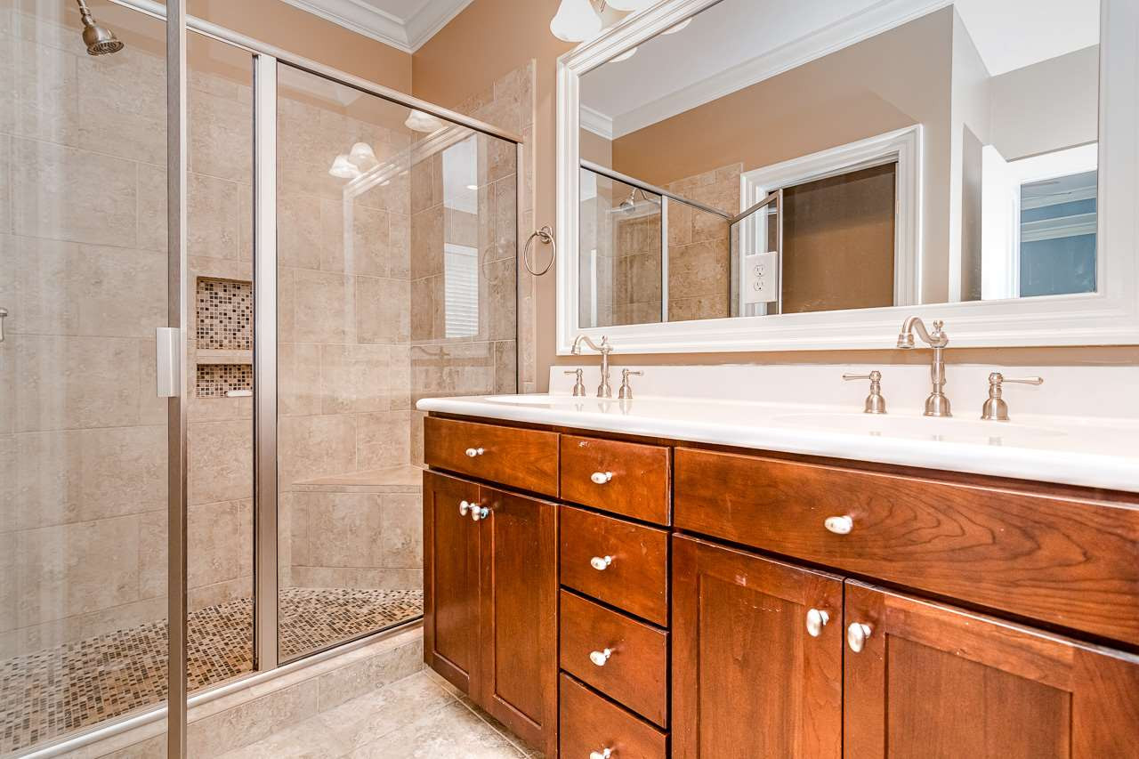 304 Redhill Road Holly Springs, NC 27540 - Photo 14 of 30 Dual sinks, walk in shower with seat, separate tub. Master Bath/Spa