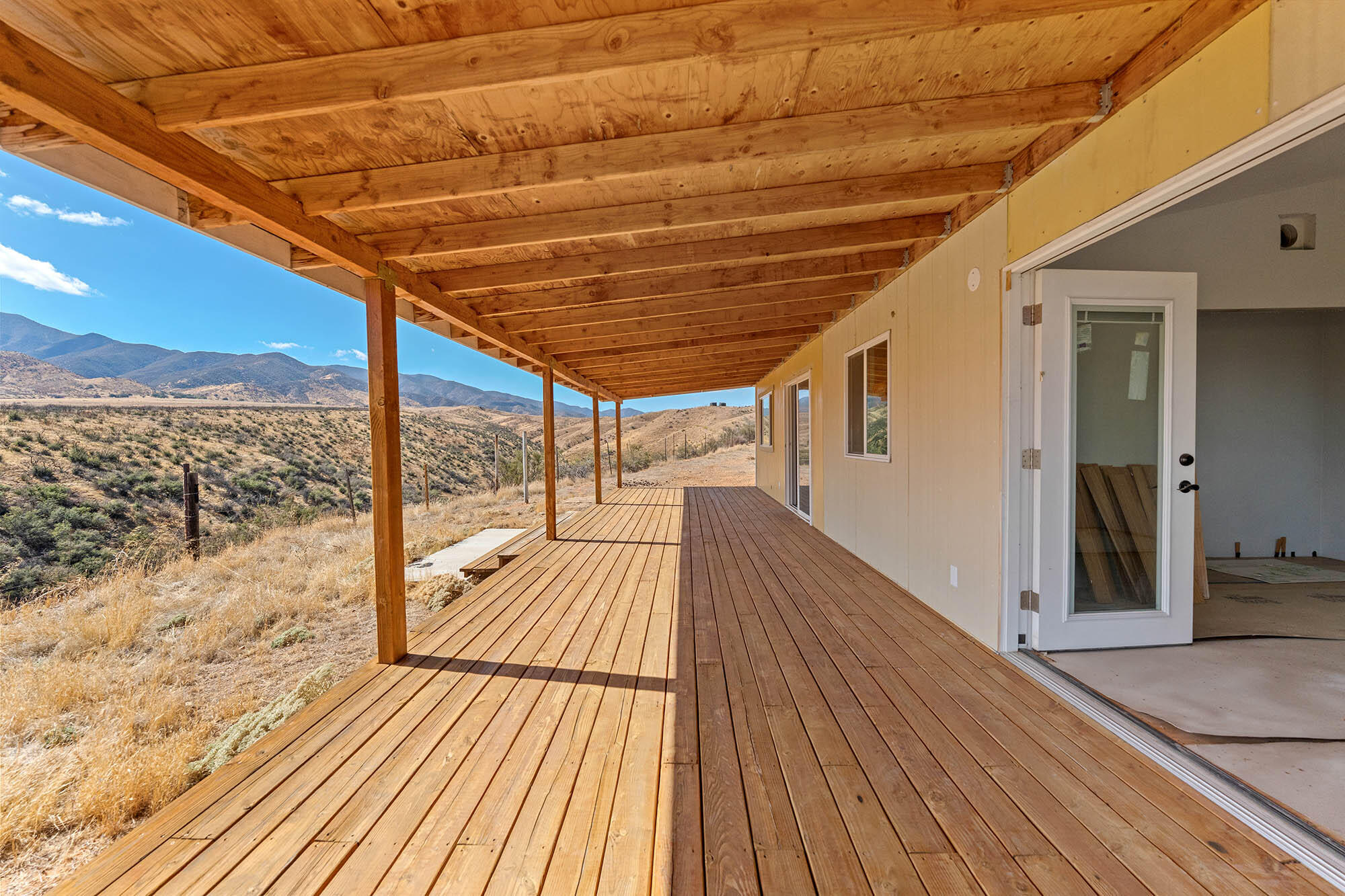 2170-7451 Aliso Park Road Cuyama, CA 93254 - Photo 20 of 72 a view of a balcony with wooden floor