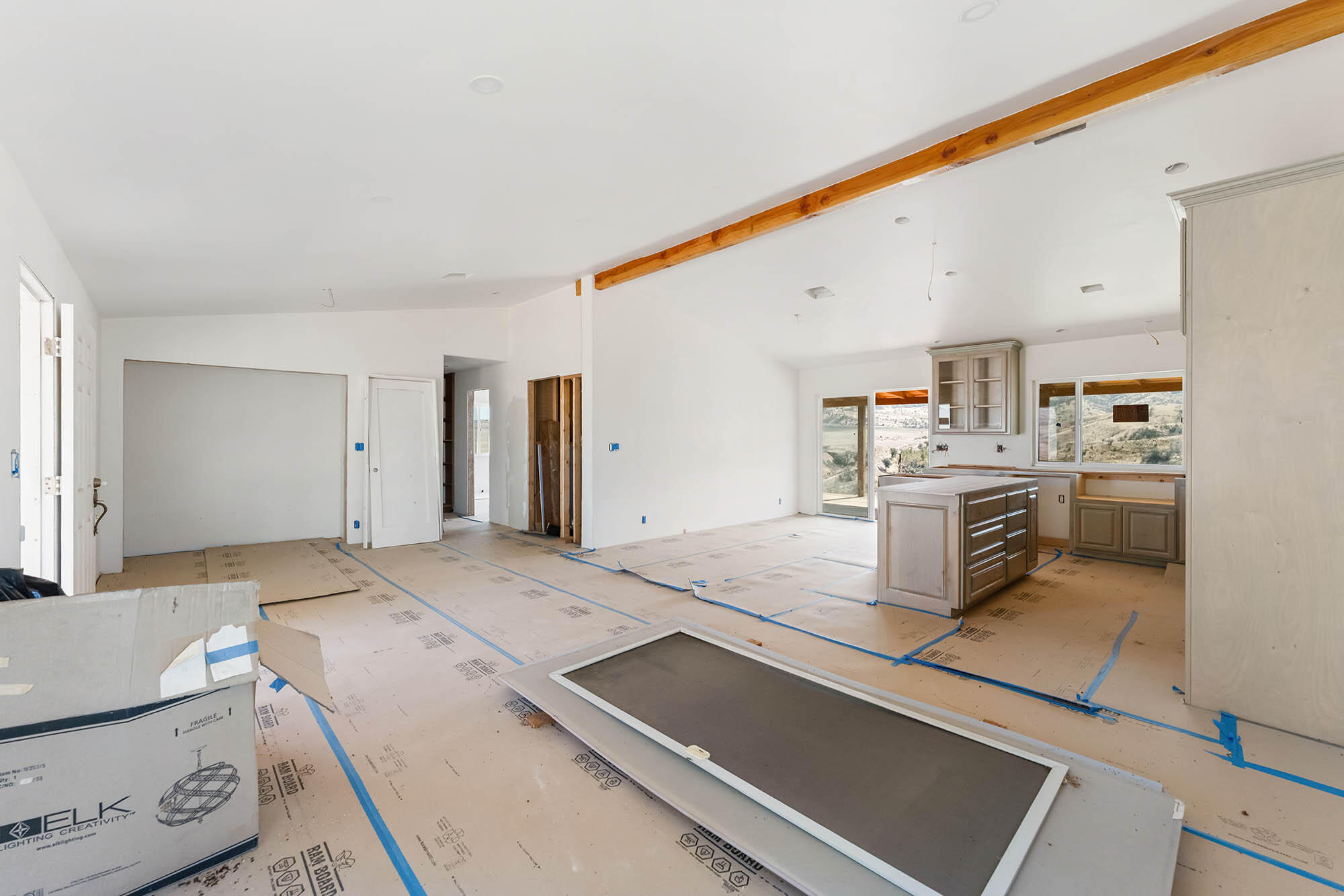 2170-7451 Aliso Park Road Cuyama, CA 93254 - Photo 22 of 72 a living room with stainless steel appliances kitchen island granite countertop a sink and cabinets