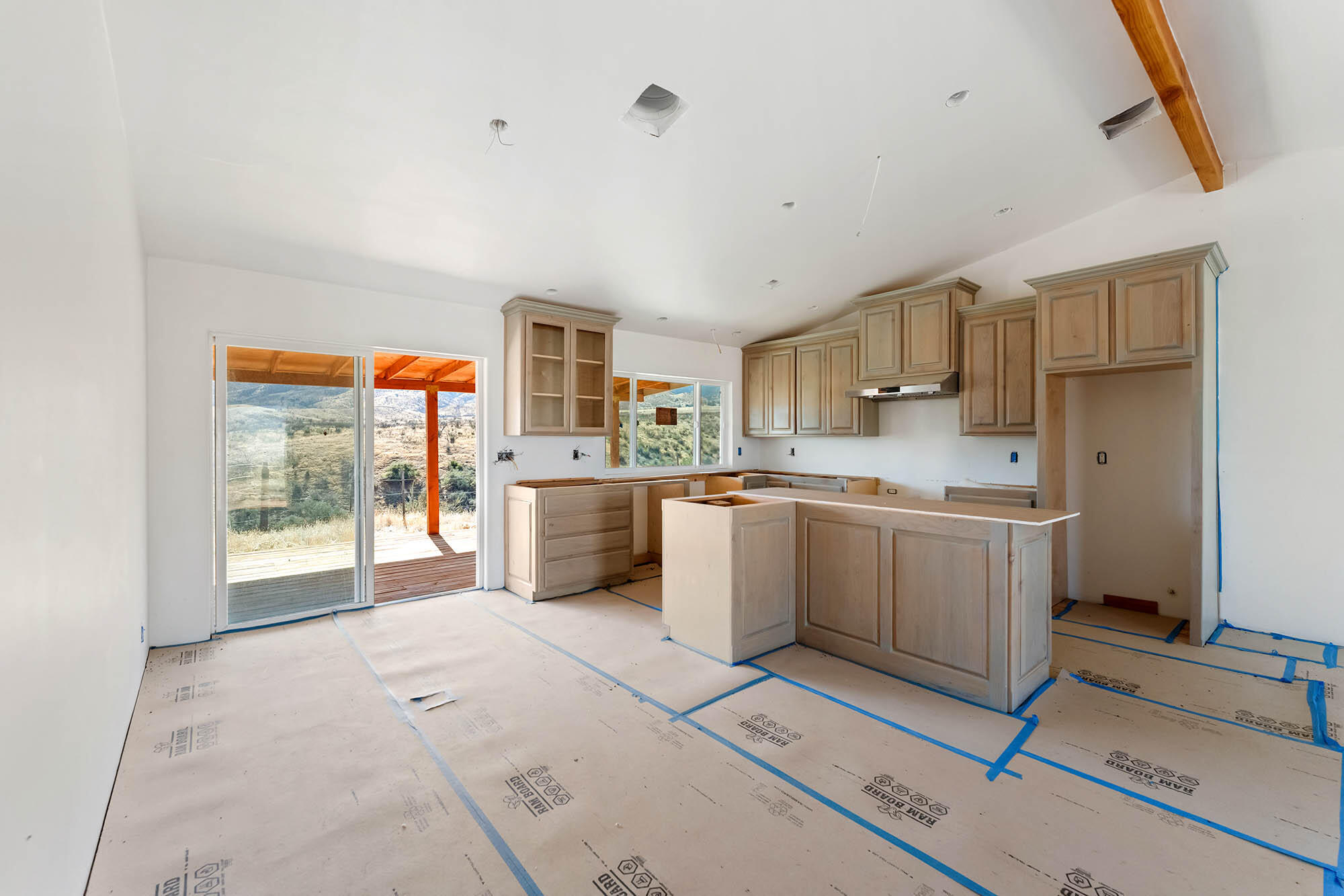 2170-7451 Aliso Park Road Cuyama, CA 93254 - Photo 23 of 72 a kitchen with a sink a counter top space cabinets and stainless steel appliances