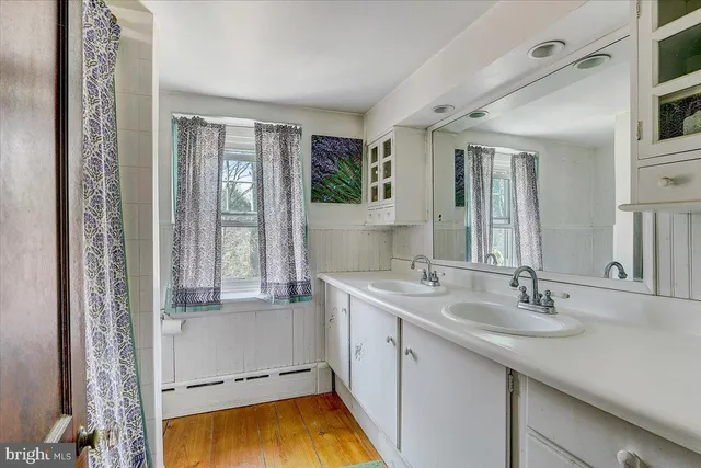a bathroom with a sink and a bathtub