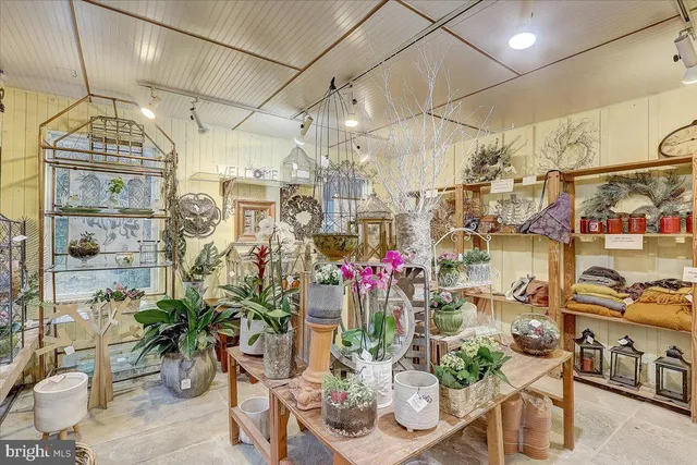 a view of a living room and dining room