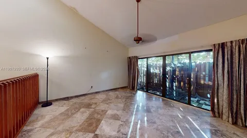 a view of a porch with wooden floor and outdoor space